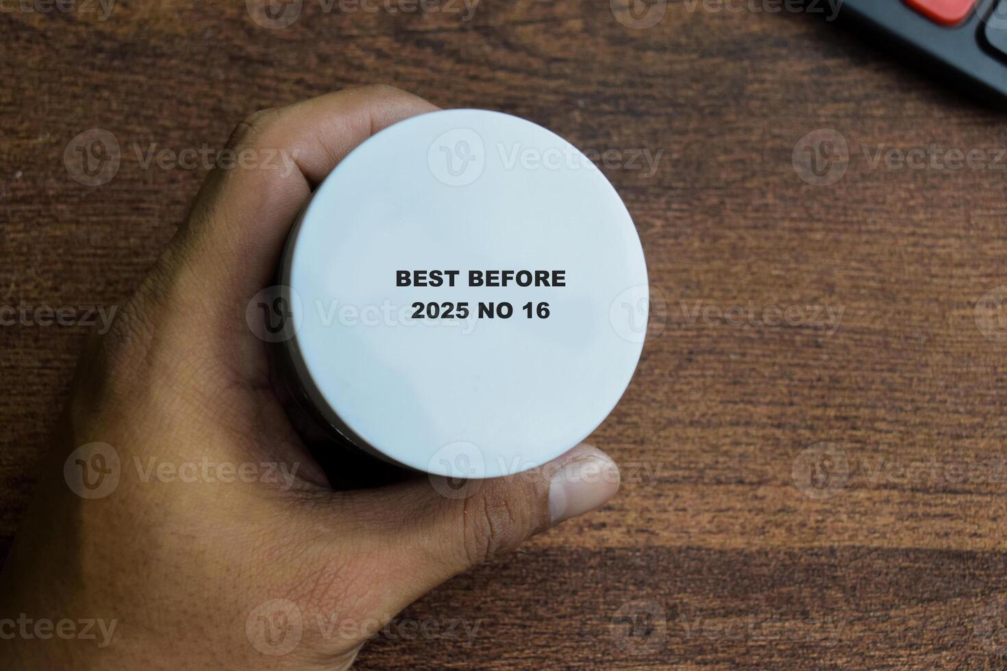 Close up text best before date on bottle cap food photo