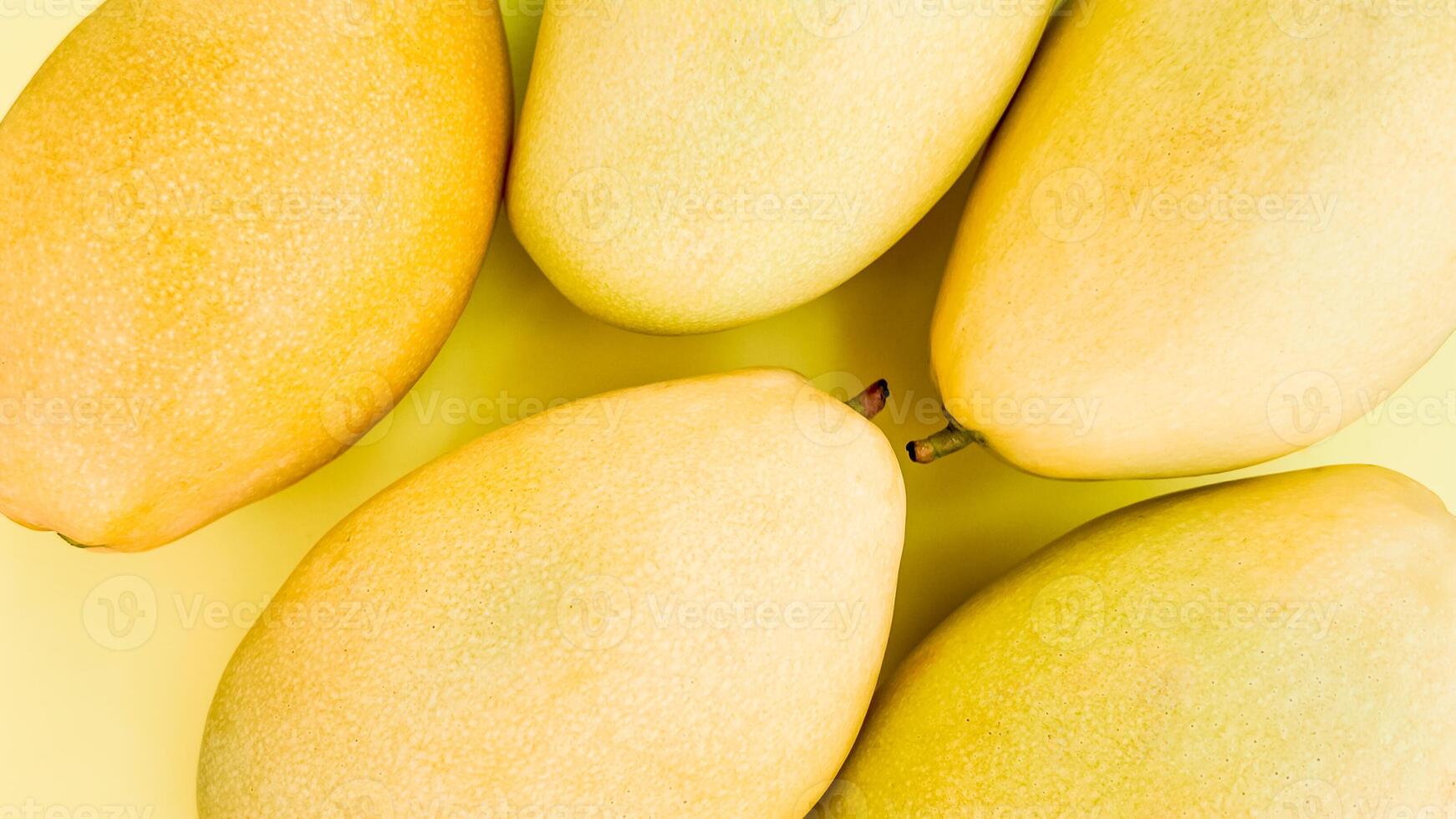 Fresh Mangoes on Yellow, Healthy Summer photo