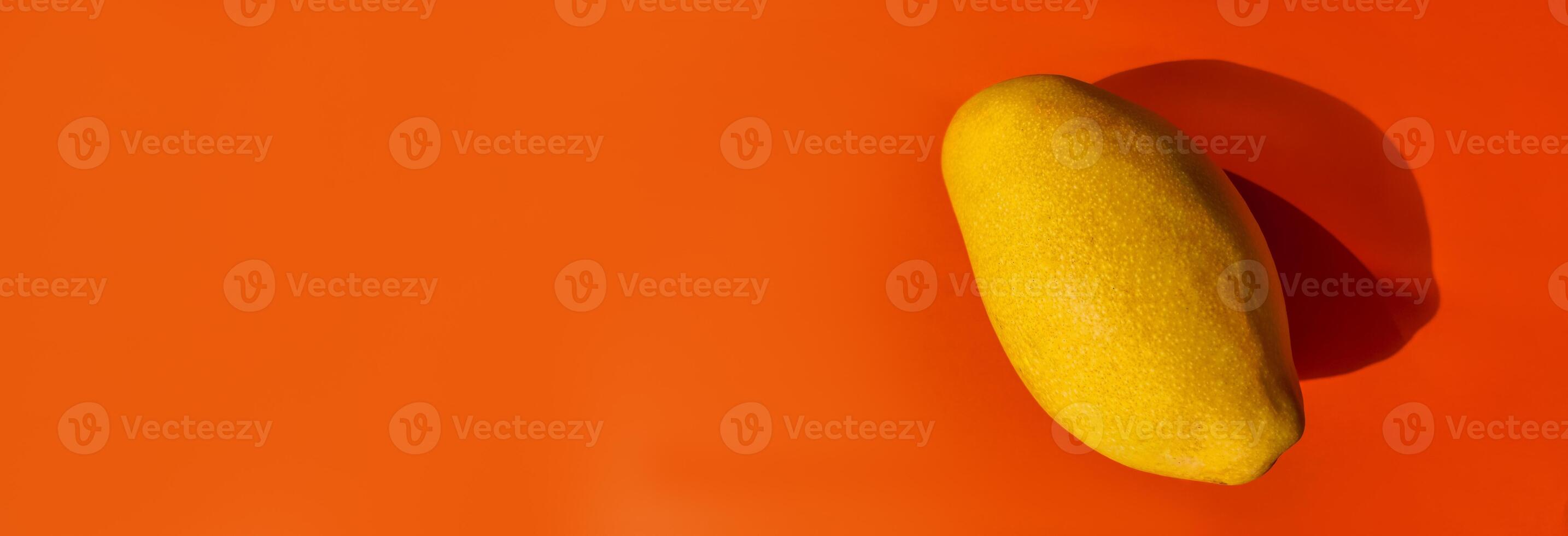 Vibrant Lemon on Orange Backdrop   Copy Space photo