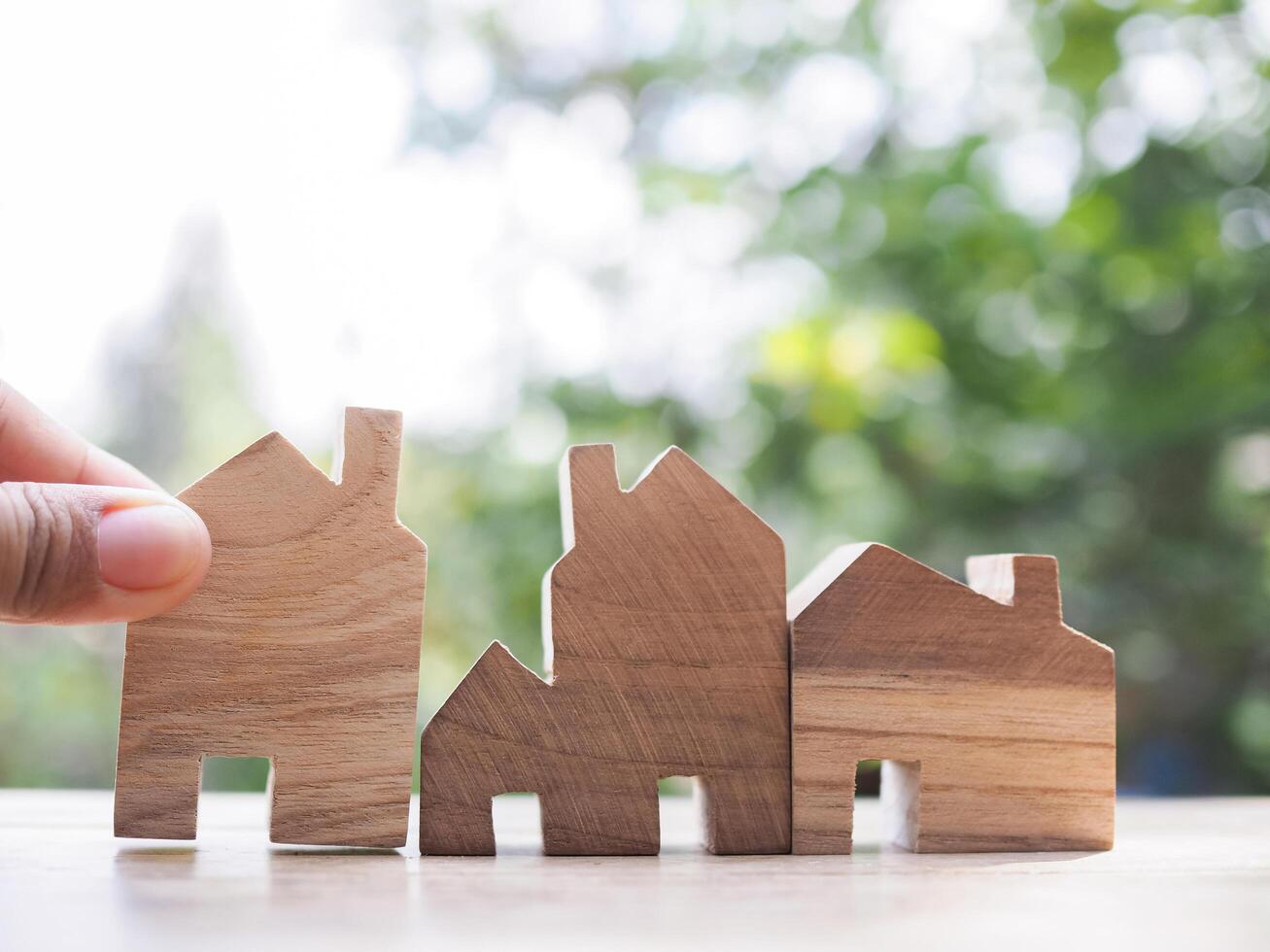 The concept of choosing the best property, choosing suitable house for planning living in the future. Real estate photo