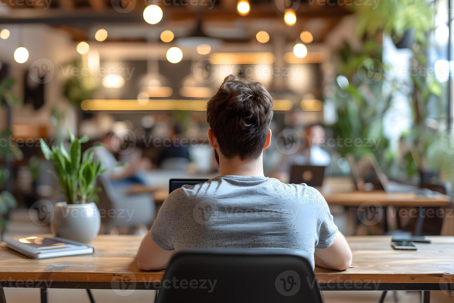 AI generated Person Works Independently in Blurred Coworking Space, Solopreneur in Action photo