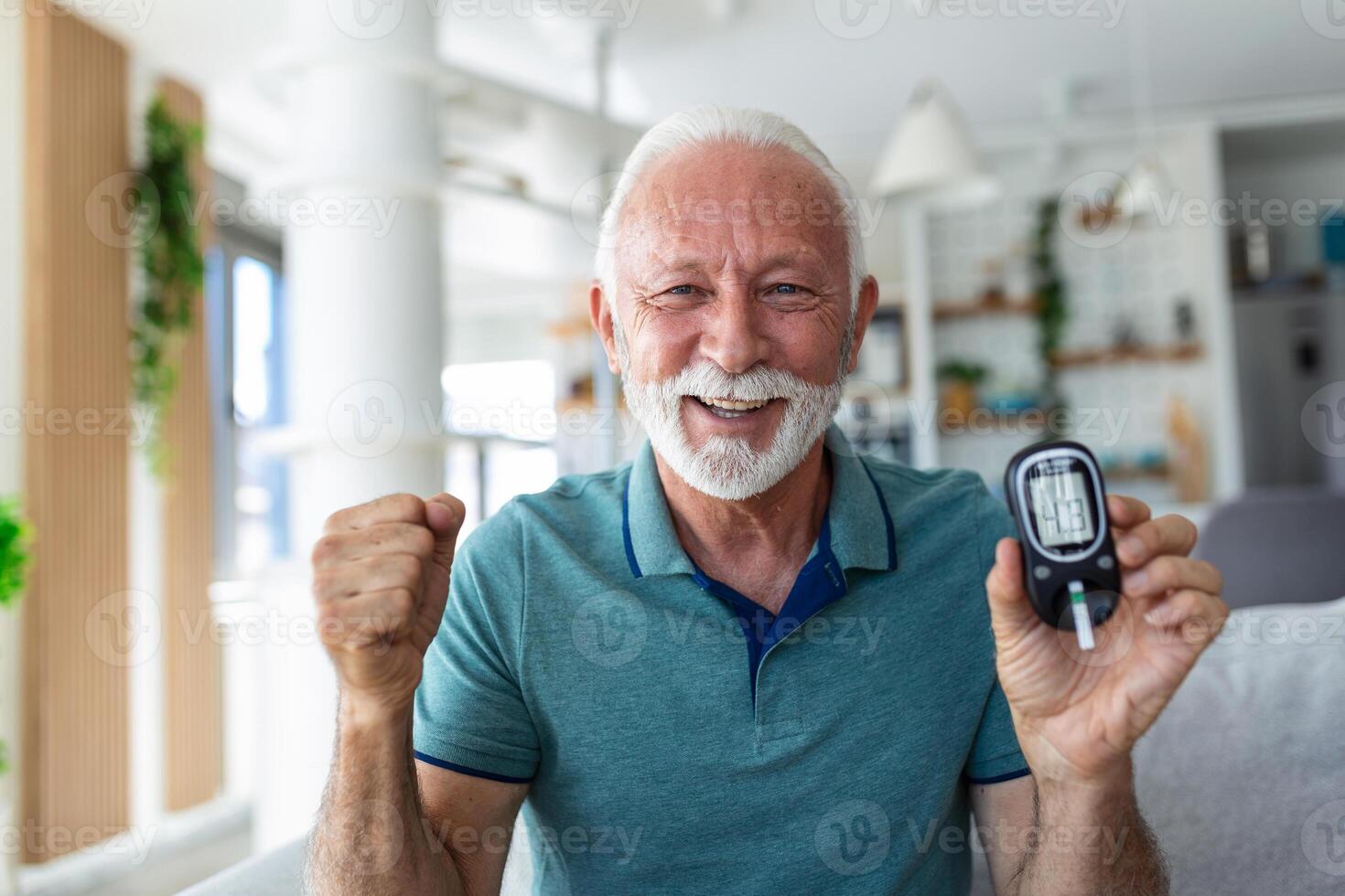 Blood sugar testing at home. Checking Blood Sugar Level At Home. Diabetic Checking Blood Sugar Levels. Senior man checking blood sugar level by glucometer and test stripe at home photo