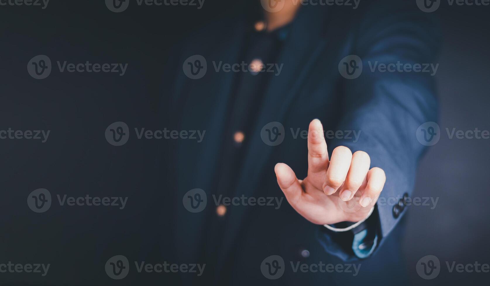 Professional man shaking hands with another person in a business deal, conveying success and agreement photo
