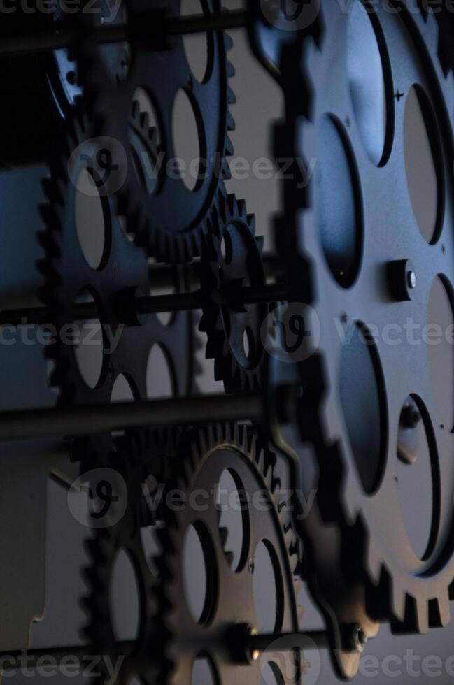 potrait shot of mechanical structure made of gears photo