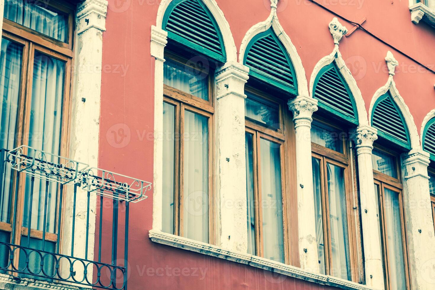 Traditional window of typical old Venice building photo