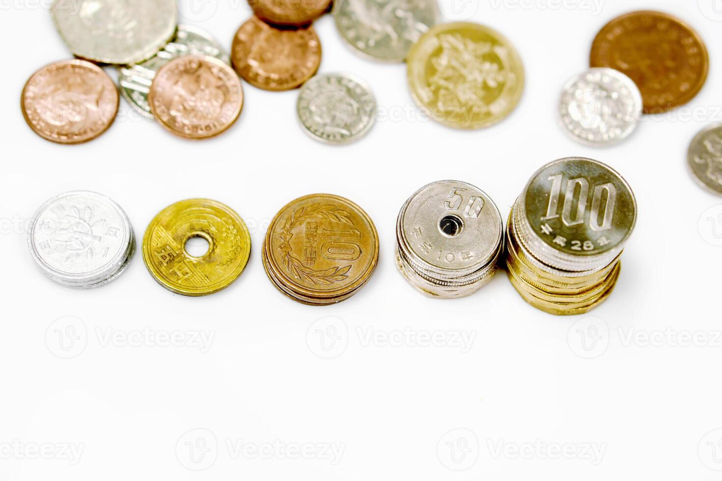 Closeup and top view line up stacked of Japan Yen currency coins isolate on white background. photo