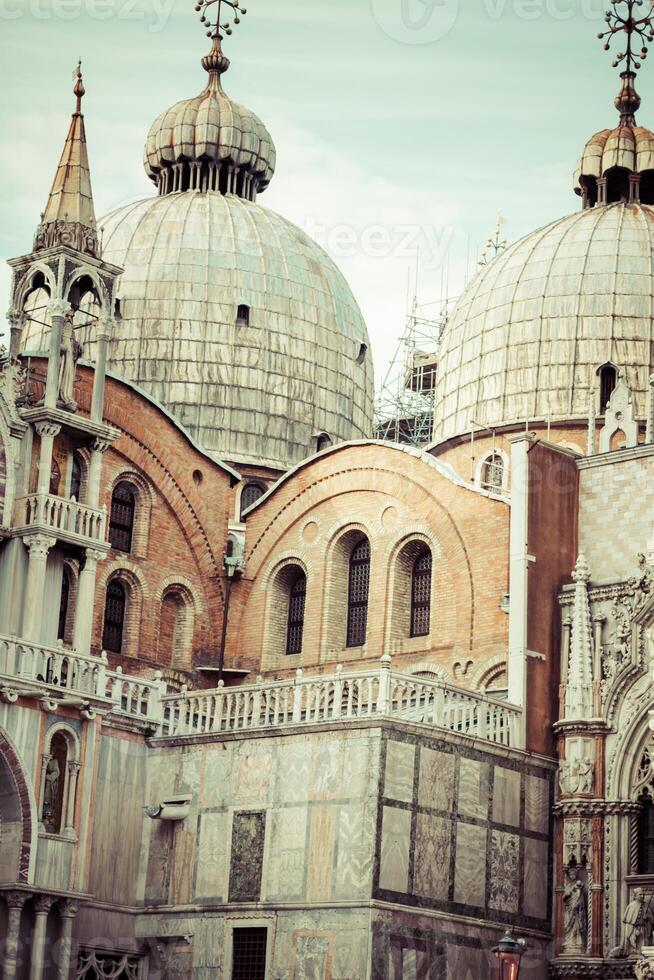The Basilica of San Marco in St. Marks square in Venice, Italy photo