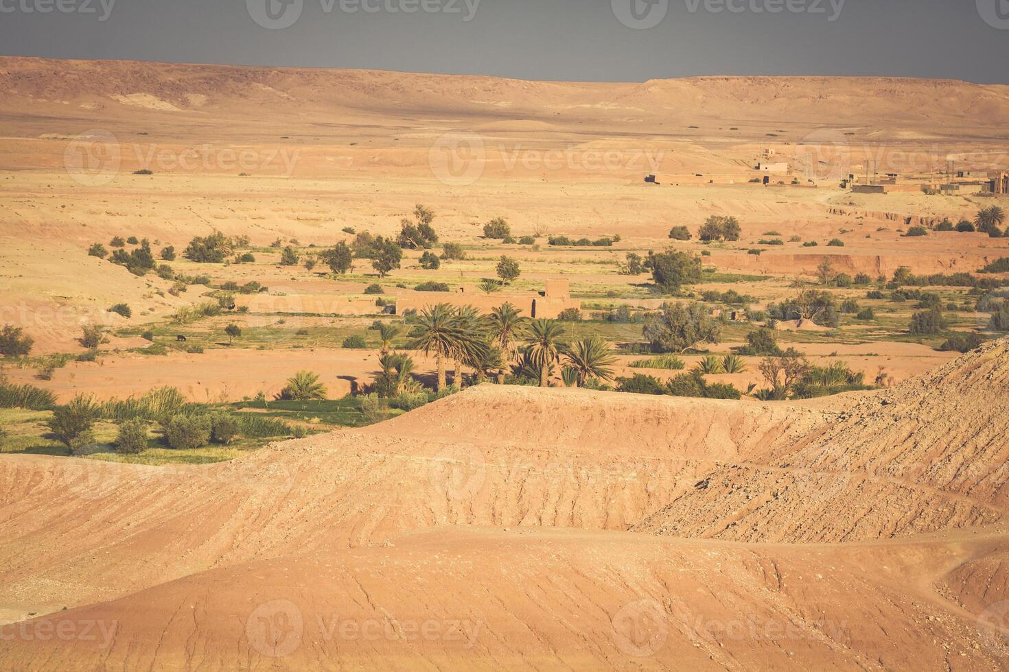 Moroccan desert with the view of mountain Atlas photo