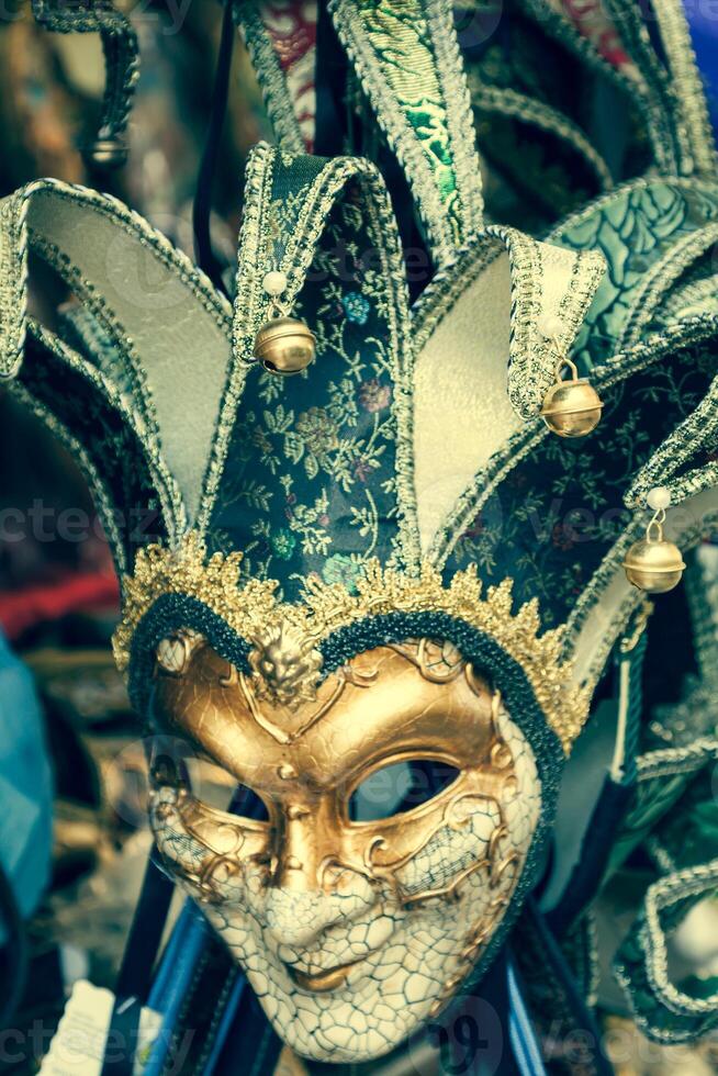 Souvenirs and carnival masks on street trading in Venice, Italy photo