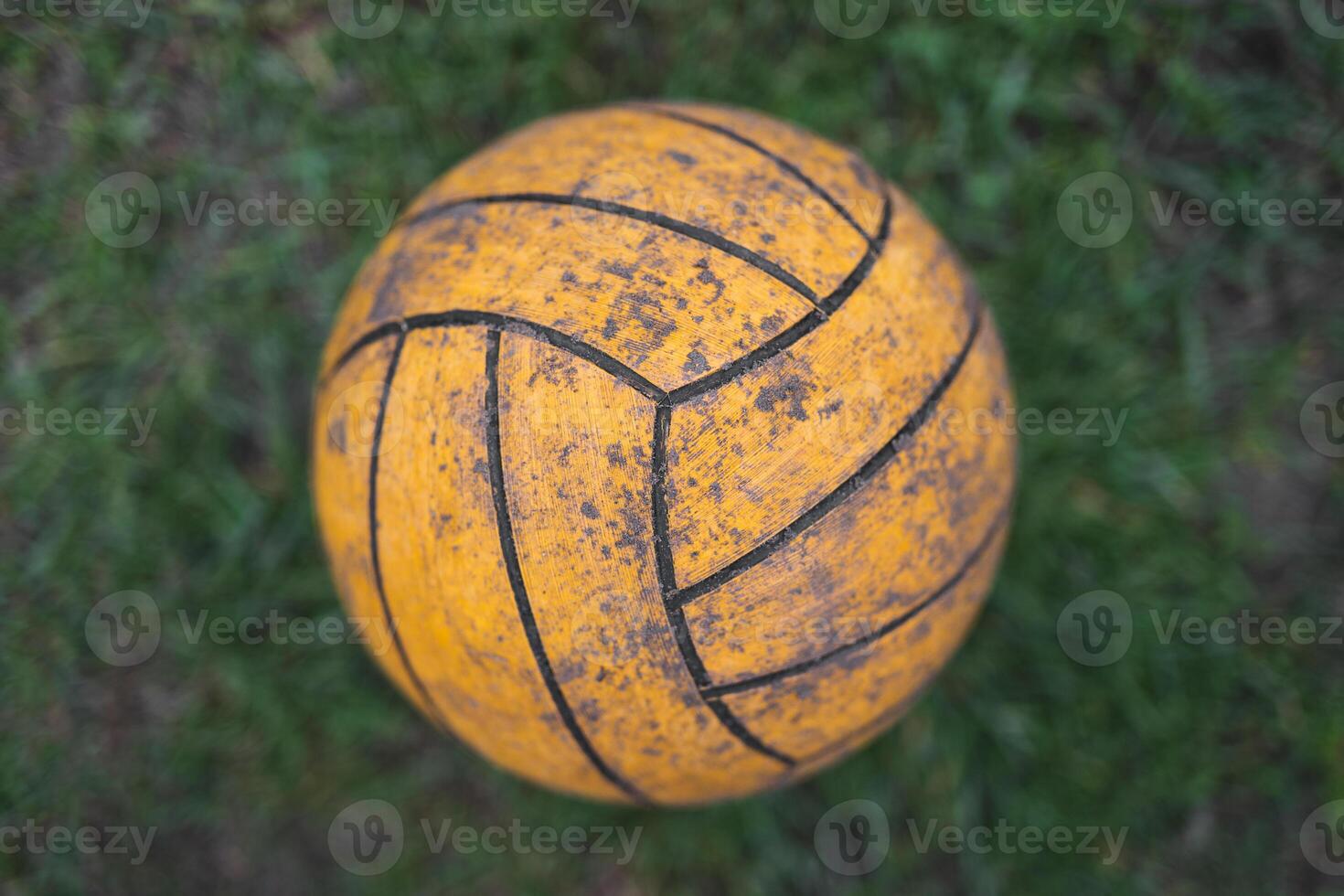 close up of a volleyball ball on the grass photo