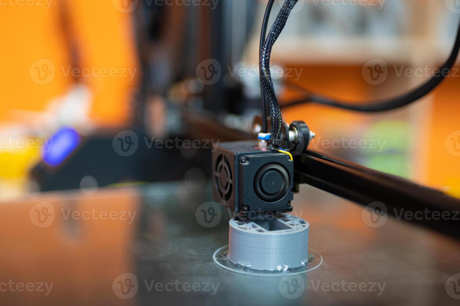 close-up of the print head of the 3D printer photo