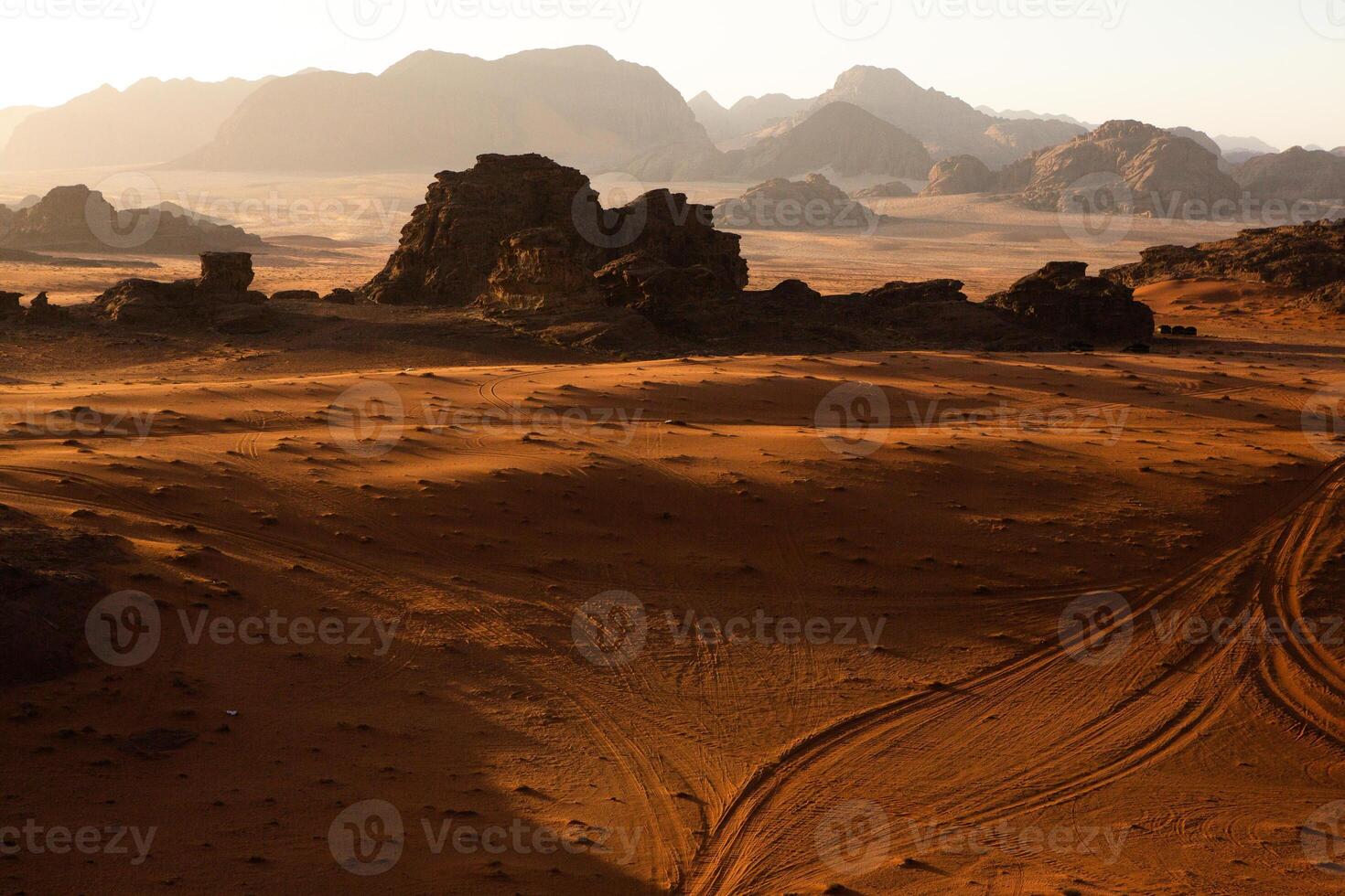 Wadi Rum Desert in Jordan. On the Sunset. Panorama of beautiful sand pattern on the dune. Desert landscape in Jordan. photo