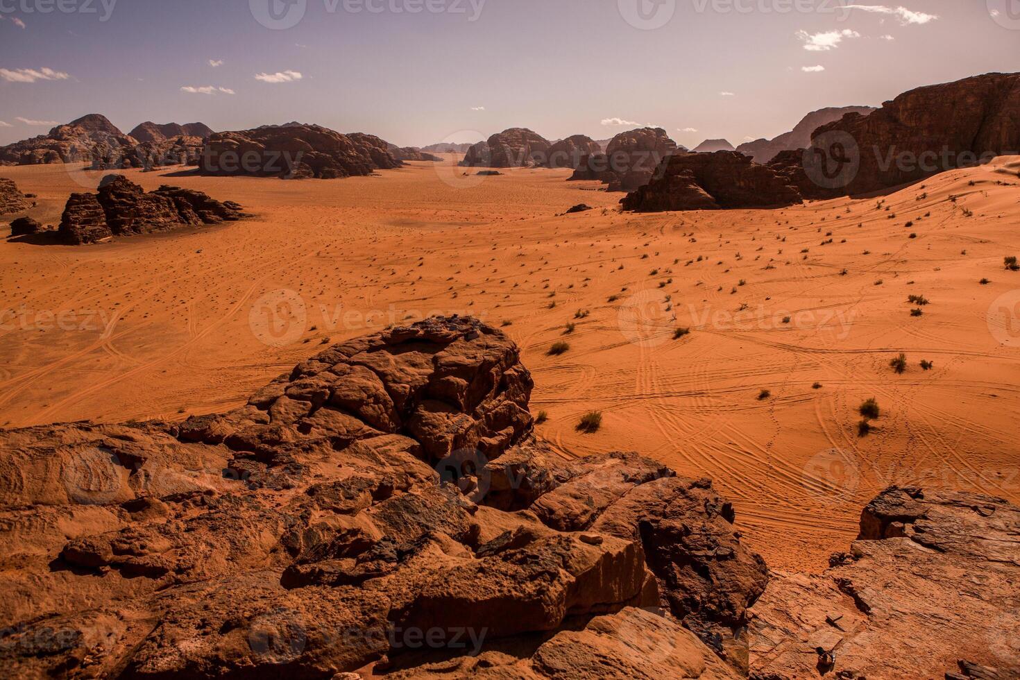 Wadi Rum Desert in Jordan. On the Sunset. Panorama of beautiful sand pattern on the dune. Desert landscape in Jordan. photo