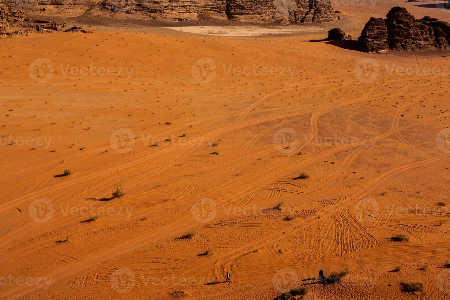 Wadi Rum Desert in Jordan. On the Sunset. Panorama of beautiful sand pattern on the dune. Desert landscape in Jordan. photo