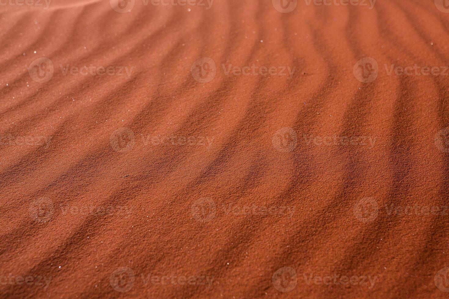 Wadi Rum Desert in Jordan. On the Sunset. Panorama of beautiful sand pattern on the dune. Desert landscape in Jordan. photo
