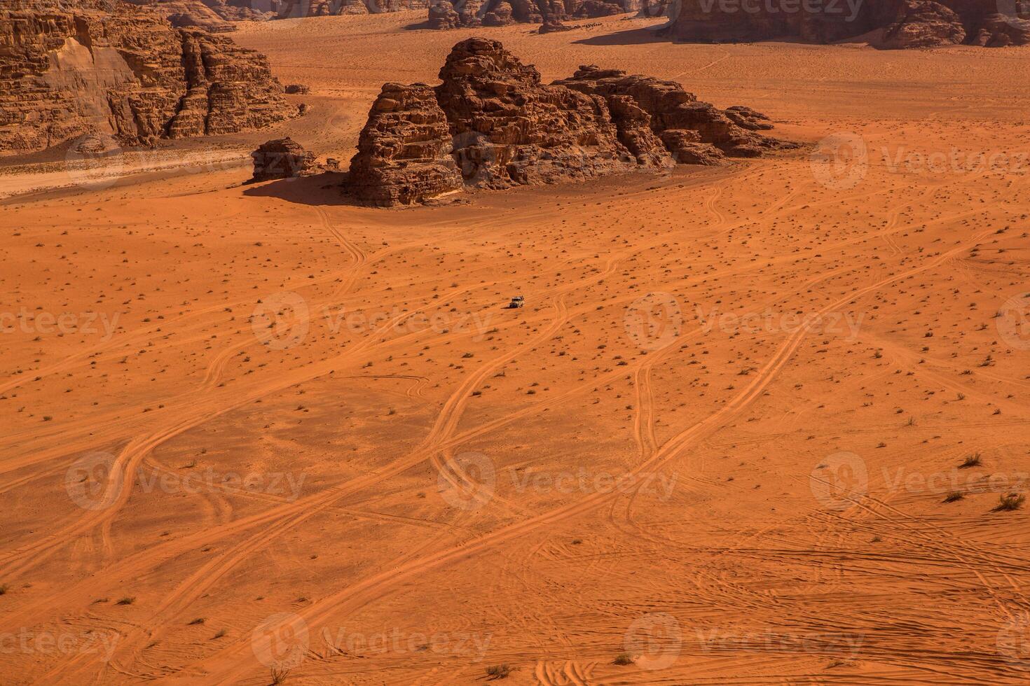 Wadi Rum Desert in Jordan. On the Sunset. Panorama of beautiful sand pattern on the dune. Desert landscape in Jordan. photo