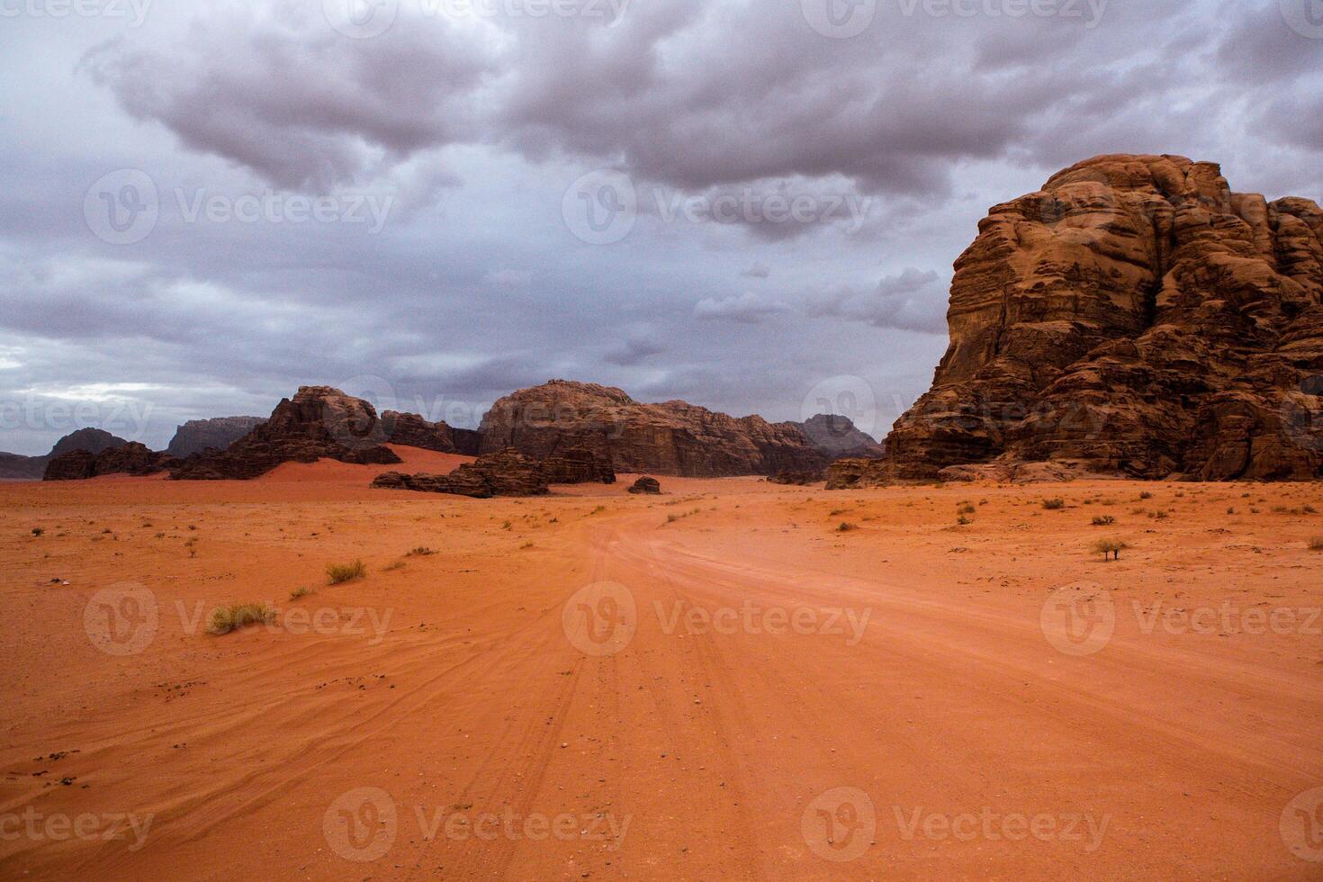 Wadi Rum Desert in Jordan. On the Sunset. Panorama of beautiful sand pattern on the dune. Desert landscape in Jordan. photo