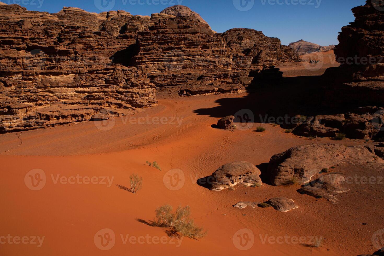 Wadi Rum Desert in Jordan. On the Sunset. Panorama of beautiful sand pattern on the dune. Desert landscape in Jordan. photo