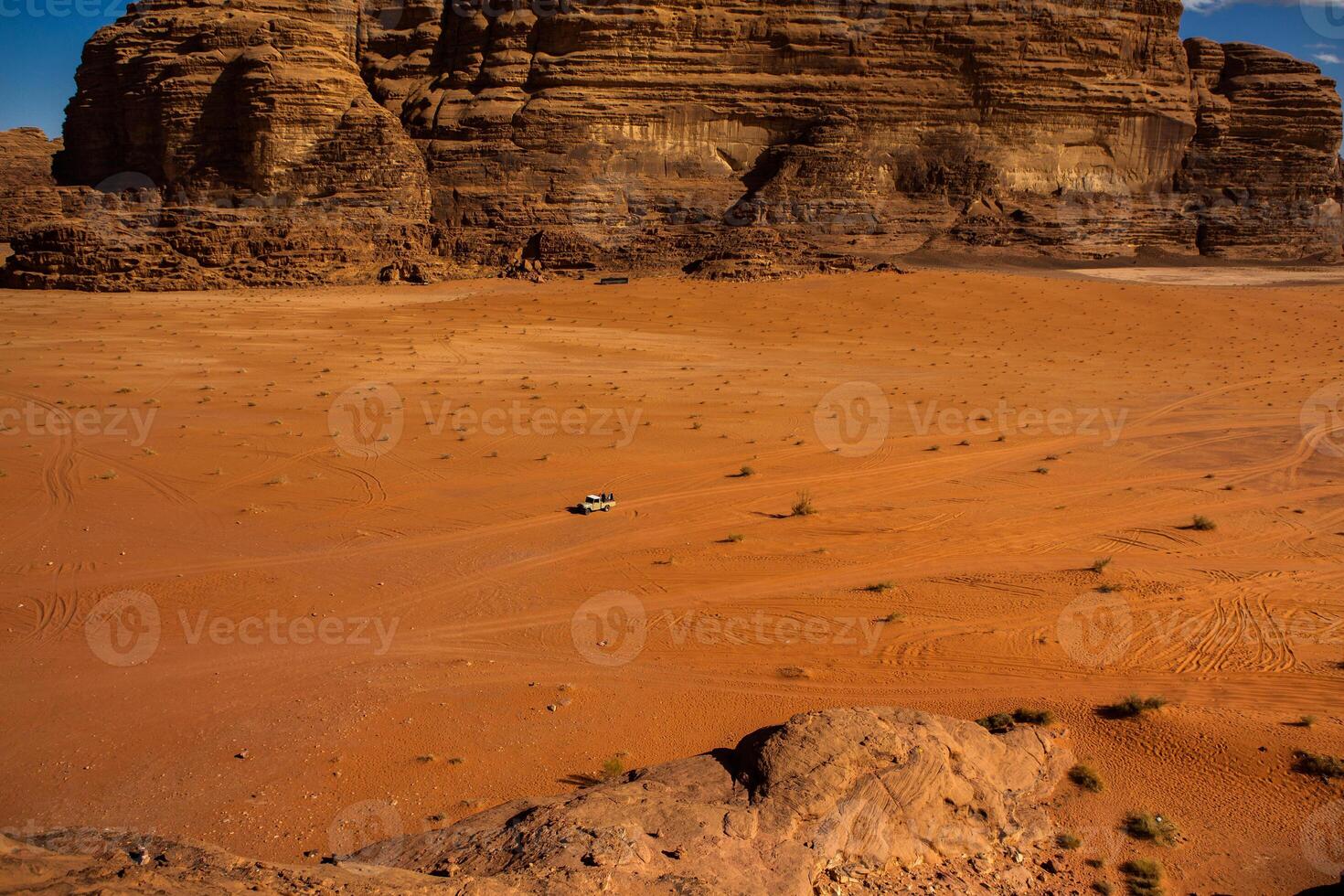 Wadi Rum Desert in Jordan. On the Sunset. Panorama of beautiful sand pattern on the dune. Desert landscape in Jordan. photo