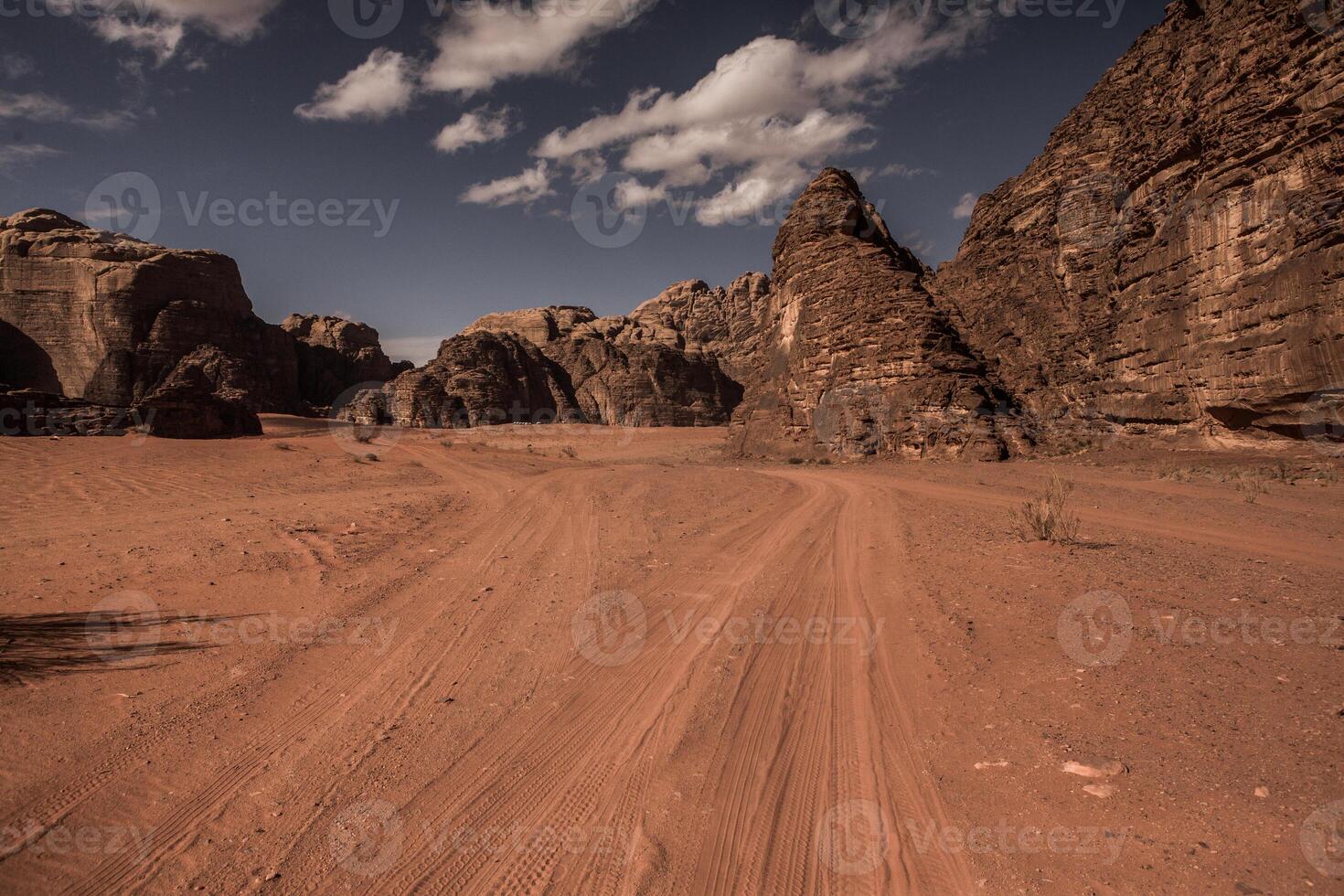 Wadi Rum Desert in Jordan. On the Sunset. Panorama of beautiful sand pattern on the dune. Desert landscape in Jordan. photo