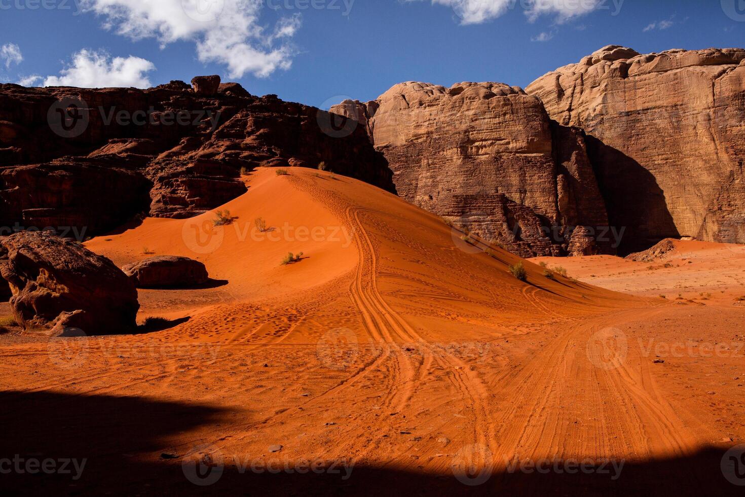 Wadi Rum Desert in Jordan. On the Sunset. Panorama of beautiful sand pattern on the dune. Desert landscape in Jordan. photo