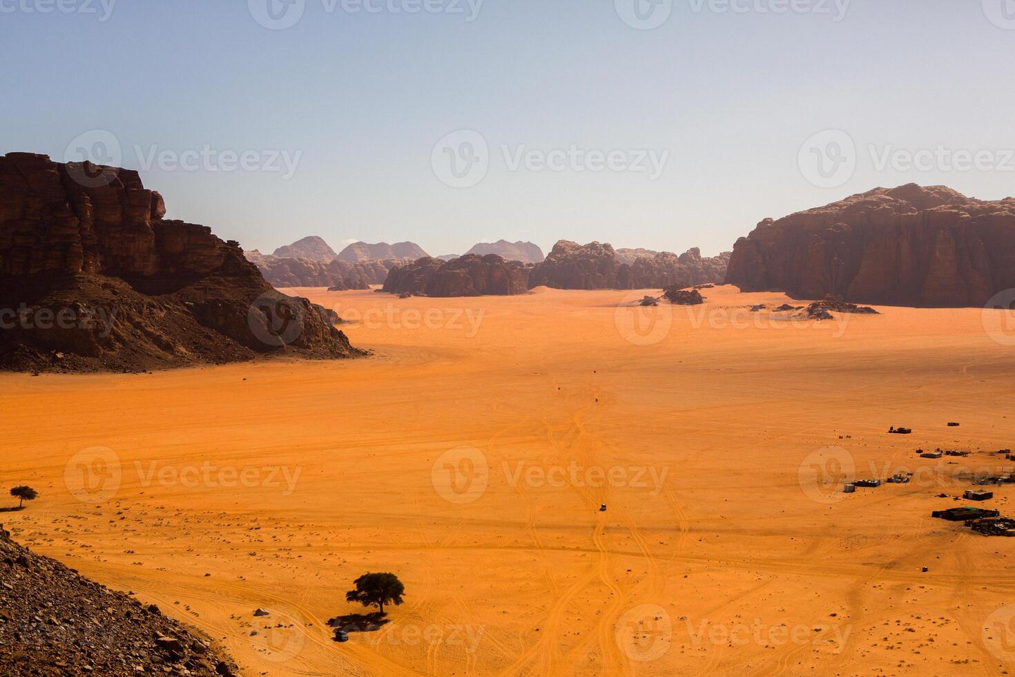 Wadi Rum Desert in Jordan. On the Sunset. Panorama of beautiful sand pattern on the dune. Desert landscape in Jordan. photo