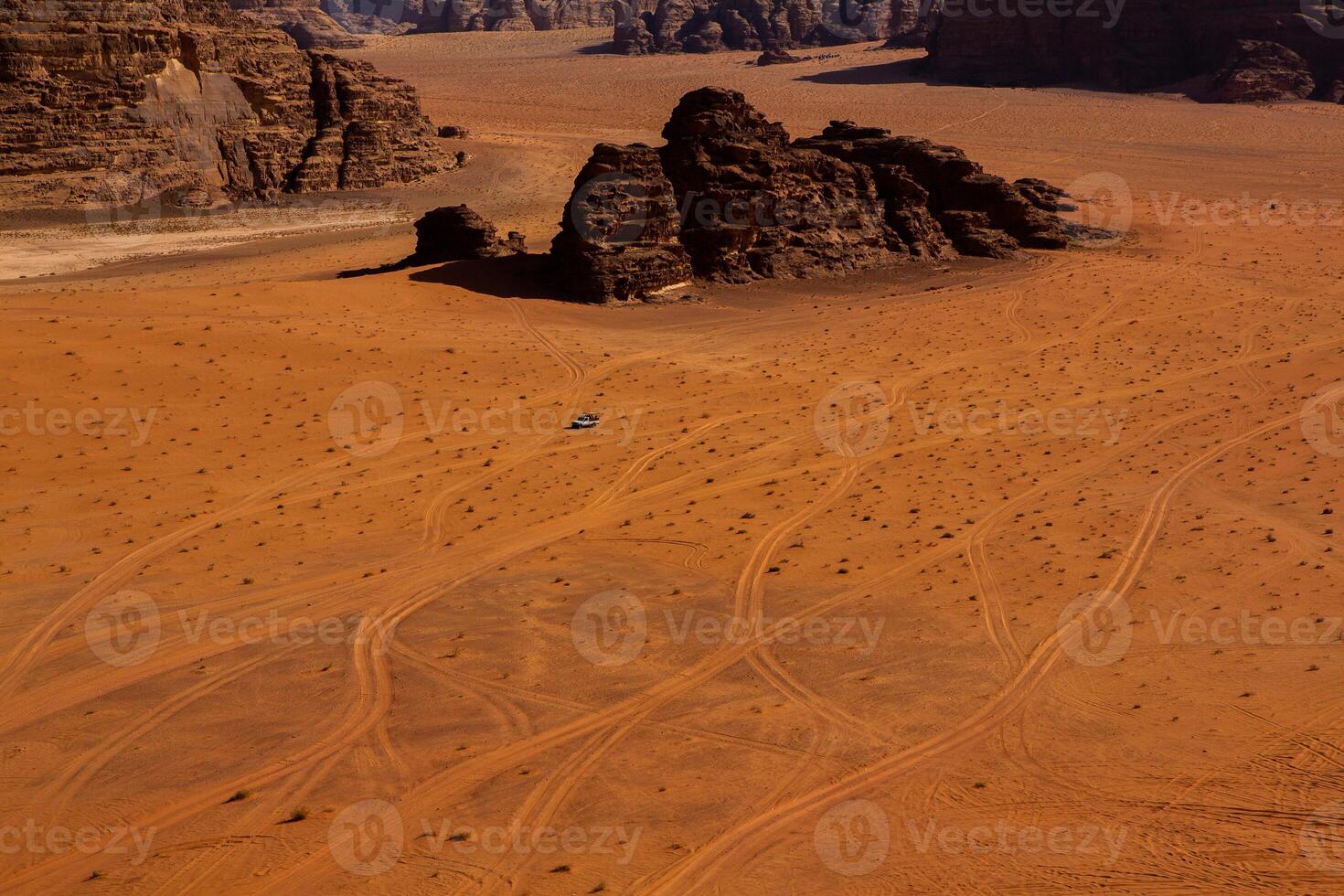 Wadi Rum Desert in Jordan. On the Sunset. Panorama of beautiful sand pattern on the dune. Desert landscape in Jordan. photo