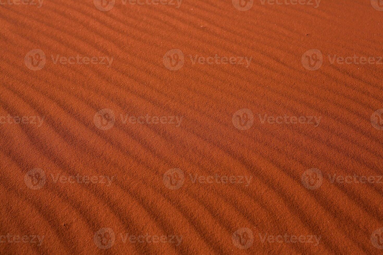 Wadi Rum Desert in Jordan. On the Sunset. Panorama of beautiful sand pattern on the dune. Desert landscape in Jordan. photo