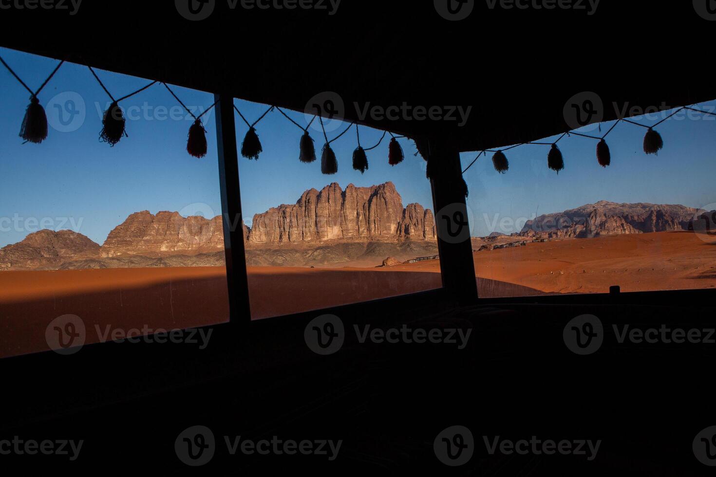 Wadi Rum Desert in Jordan. On the Sunset. Panorama of beautiful sand pattern on the dune. Desert landscape in Jordan. photo