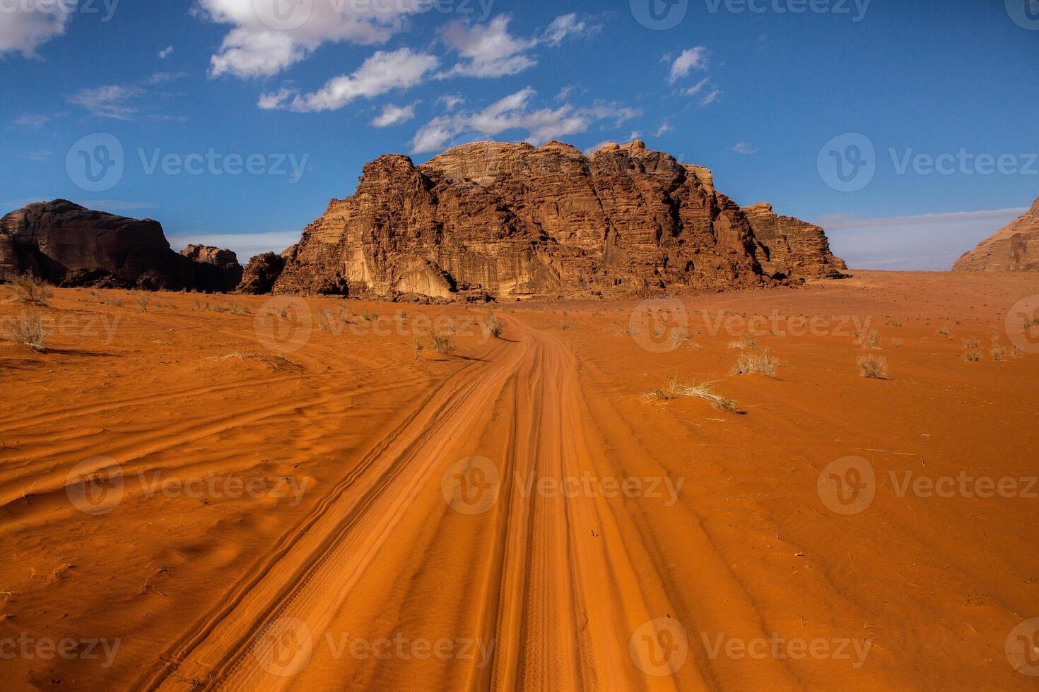 Wadi Rum Desert in Jordan. On the Sunset. Panorama of beautiful sand pattern on the dune. Desert landscape in Jordan. photo