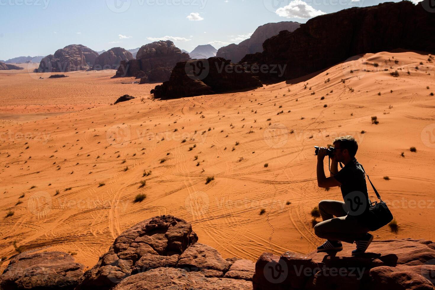 Wadi Rum Desert in Jordan. On the Sunset. Panorama of beautiful sand pattern on the dune. Desert landscape in Jordan. photo
