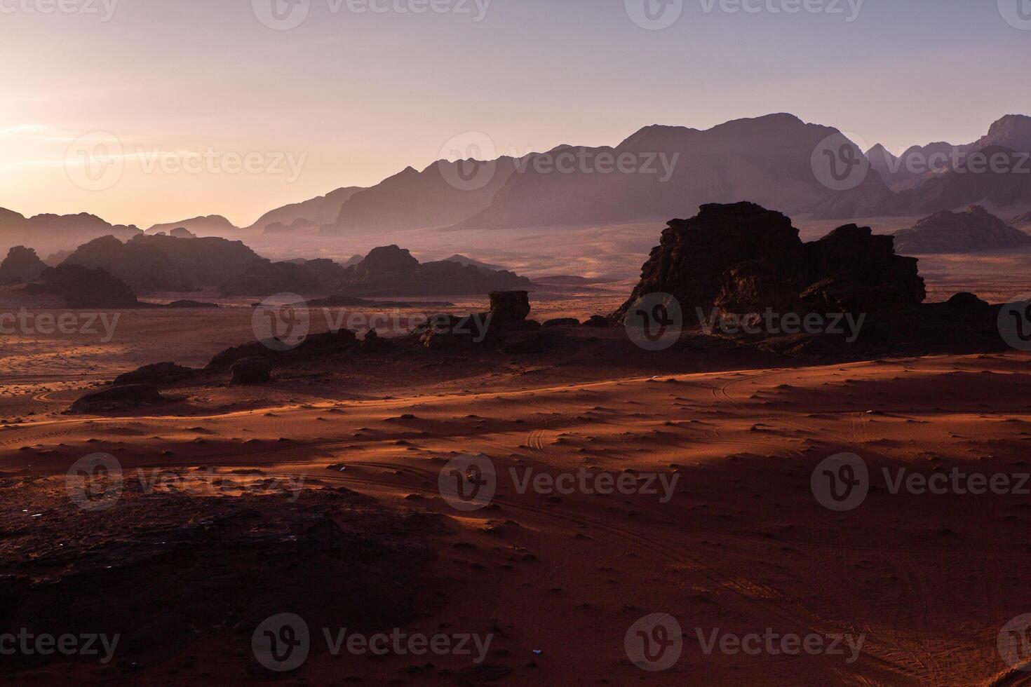 Wadi Rum Desert in Jordan. On the Sunset. Panorama of beautiful sand pattern on the dune. Desert landscape in Jordan. photo