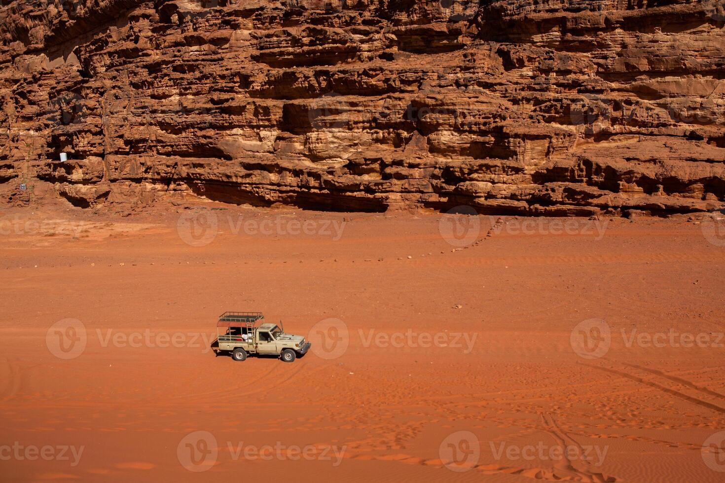 Wadi Rum Desert in Jordan. On the Sunset. Panorama of beautiful sand pattern on the dune. Desert landscape in Jordan. photo