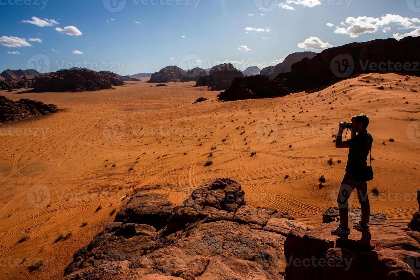Wadi Rum Desert in Jordan. On the Sunset. Panorama of beautiful sand pattern on the dune. Desert landscape in Jordan. photo