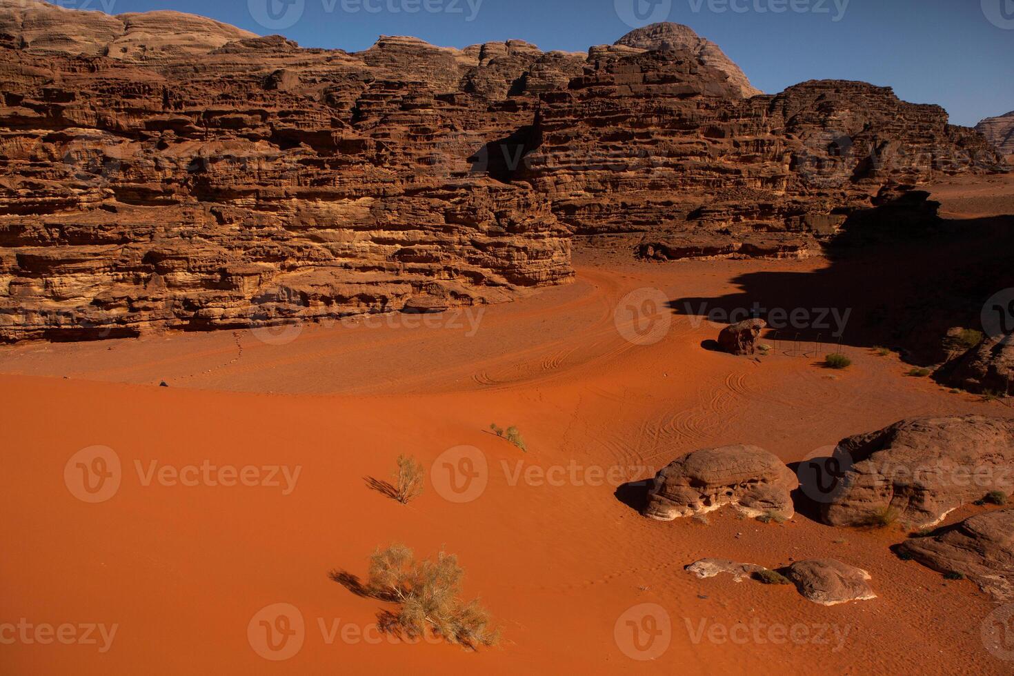 Wadi Rum Desert in Jordan. On the Sunset. Panorama of beautiful sand pattern on the dune. Desert landscape in Jordan. photo