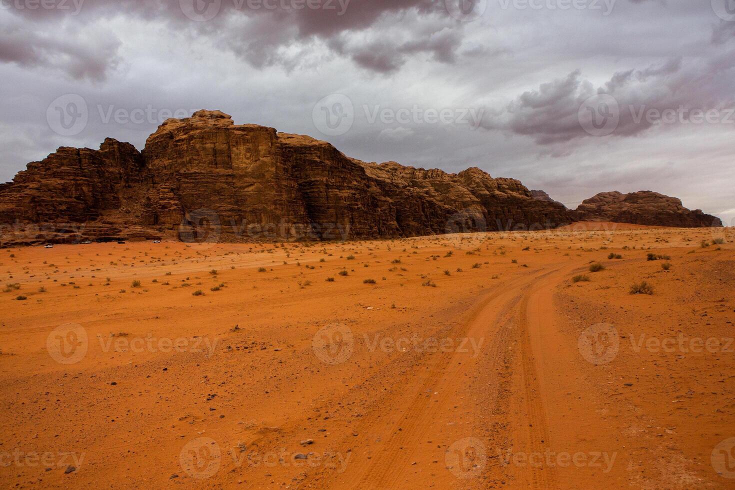 Wadi Rum Desert in Jordan. On the Sunset. Panorama of beautiful sand pattern on the dune. Desert landscape in Jordan. photo