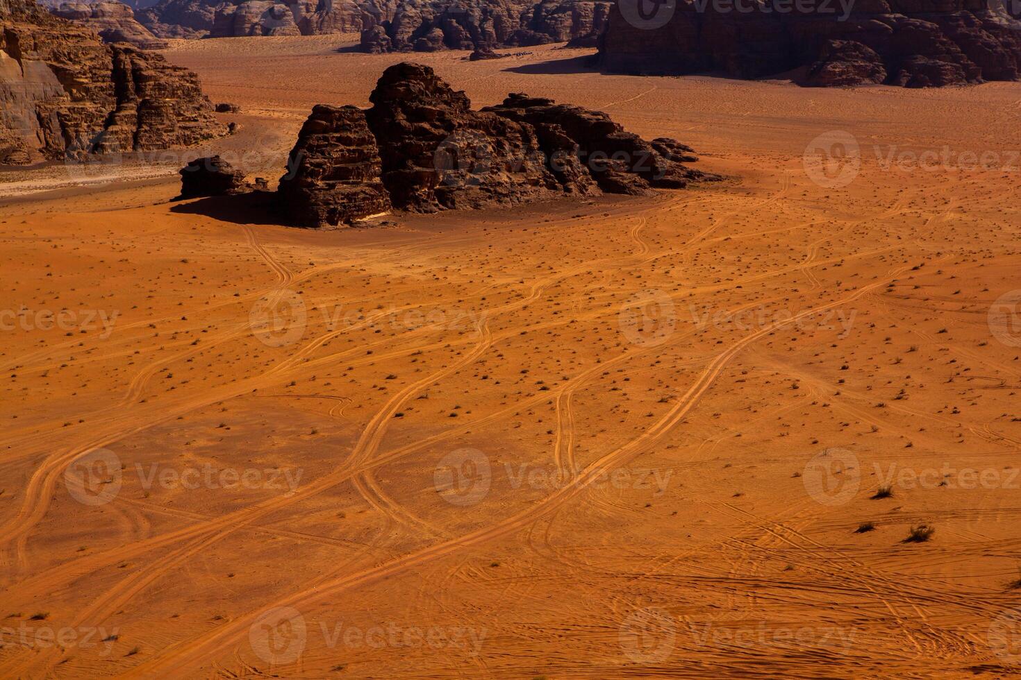 Wadi Rum Desert in Jordan. On the Sunset. Panorama of beautiful sand pattern on the dune. Desert landscape in Jordan. photo