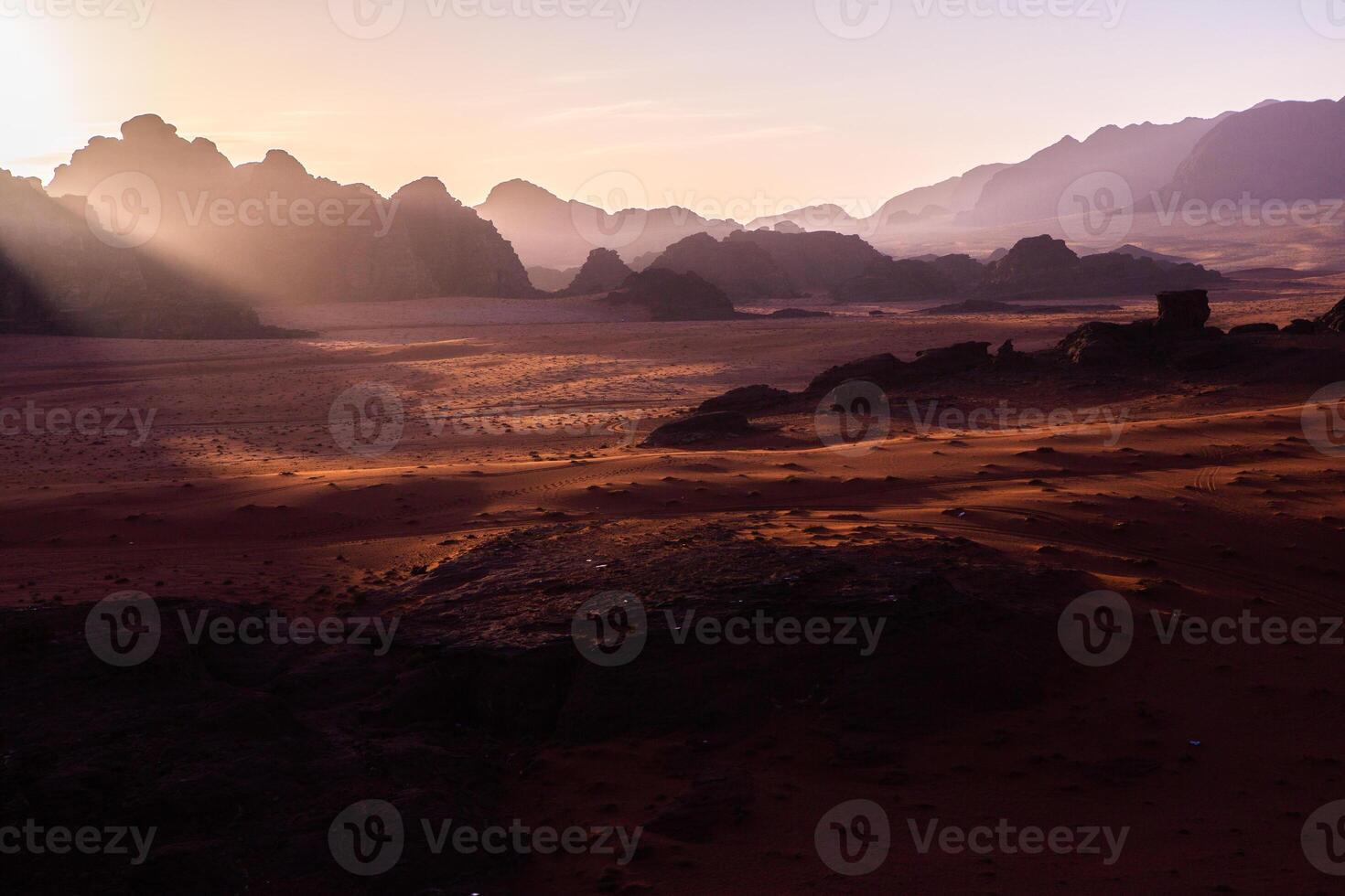 Wadi Rum Desert in Jordan. On the Sunset. Panorama of beautiful sand pattern on the dune. Desert landscape in Jordan. photo