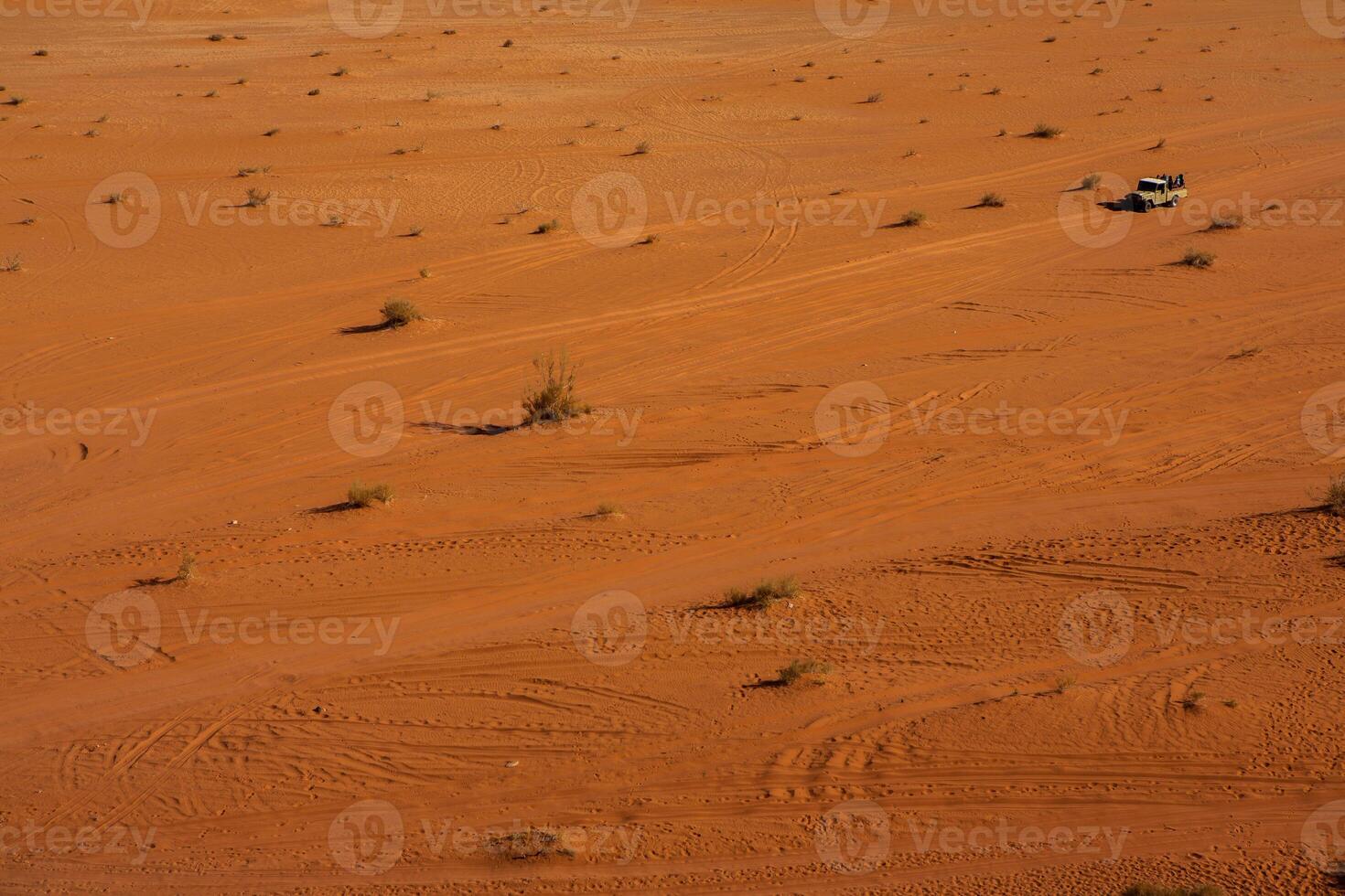 Wadi Rum Desert in Jordan. On the Sunset. Panorama of beautiful sand pattern on the dune. Desert landscape in Jordan. photo
