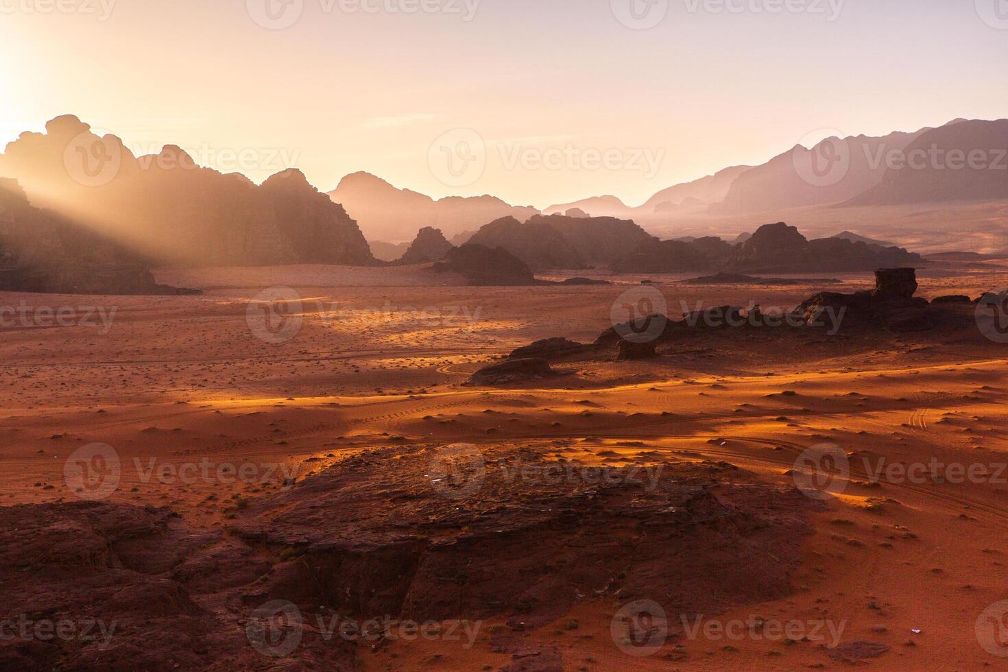 Wadi Rum Desert in Jordan. On the Sunset. Panorama of beautiful sand pattern on the dune. Desert landscape in Jordan. photo