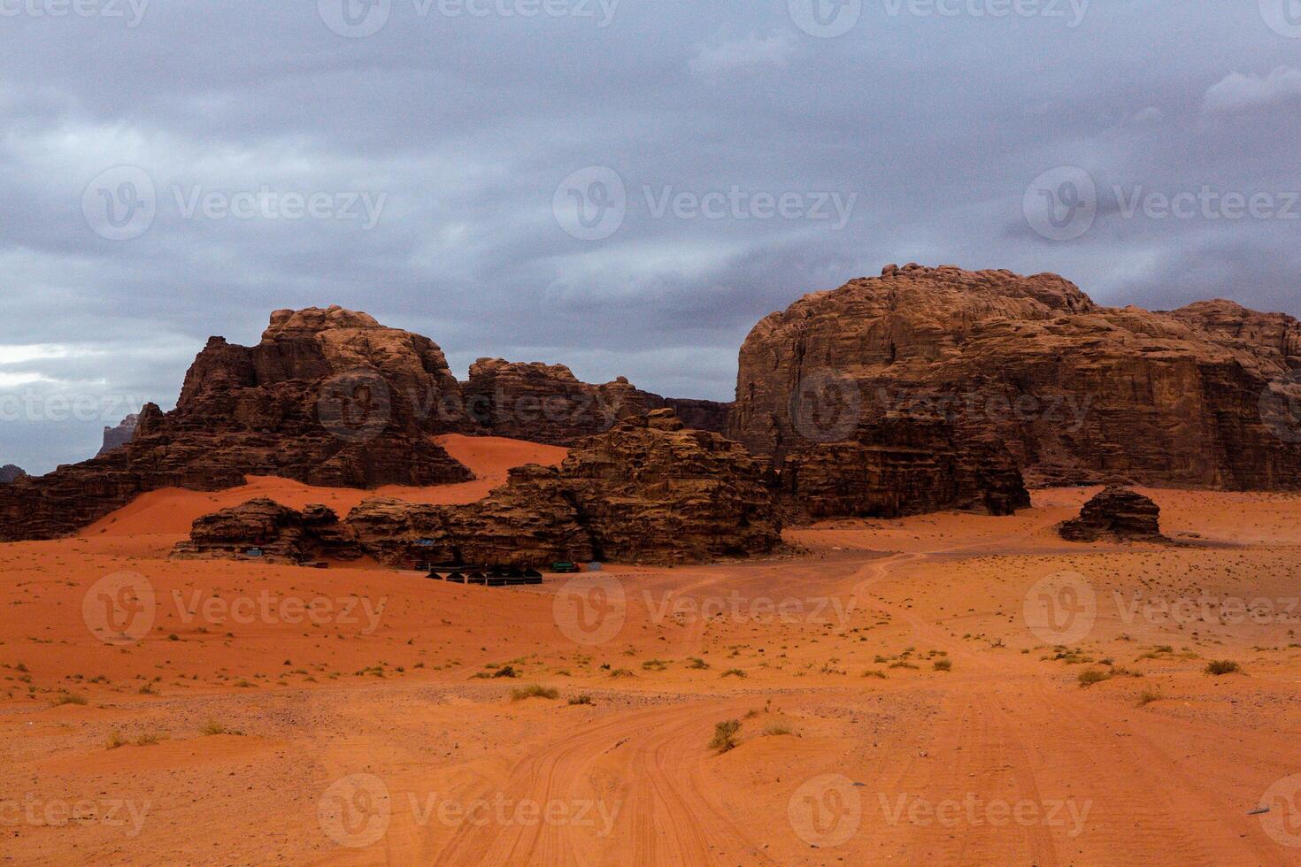 Wadi Rum Desert in Jordan. On the Sunset. Panorama of beautiful sand pattern on the dune. Desert landscape in Jordan. photo