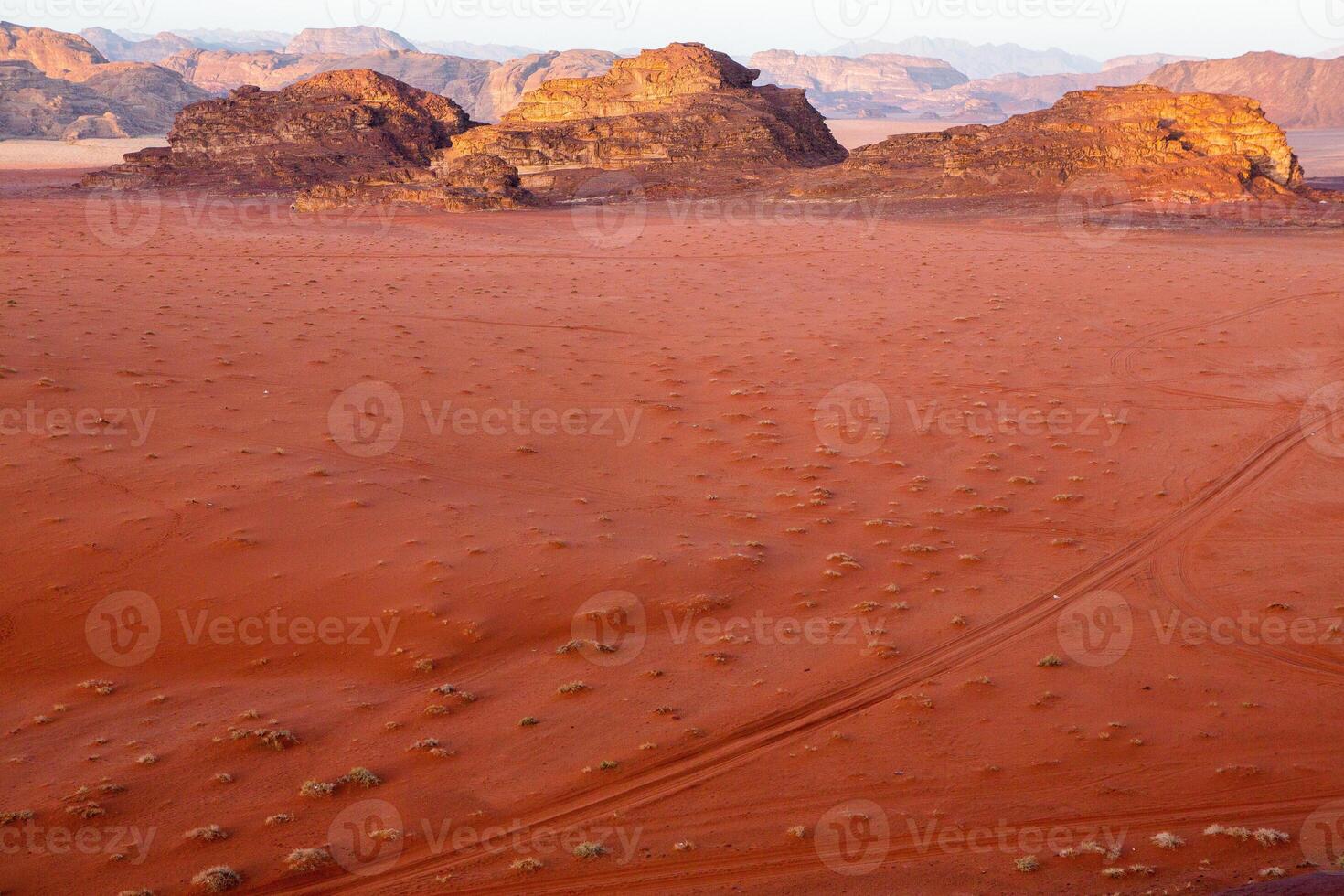 Wadi Rum Desert in Jordan. On the Sunset. Panorama of beautiful sand pattern on the dune. Desert landscape in Jordan. photo