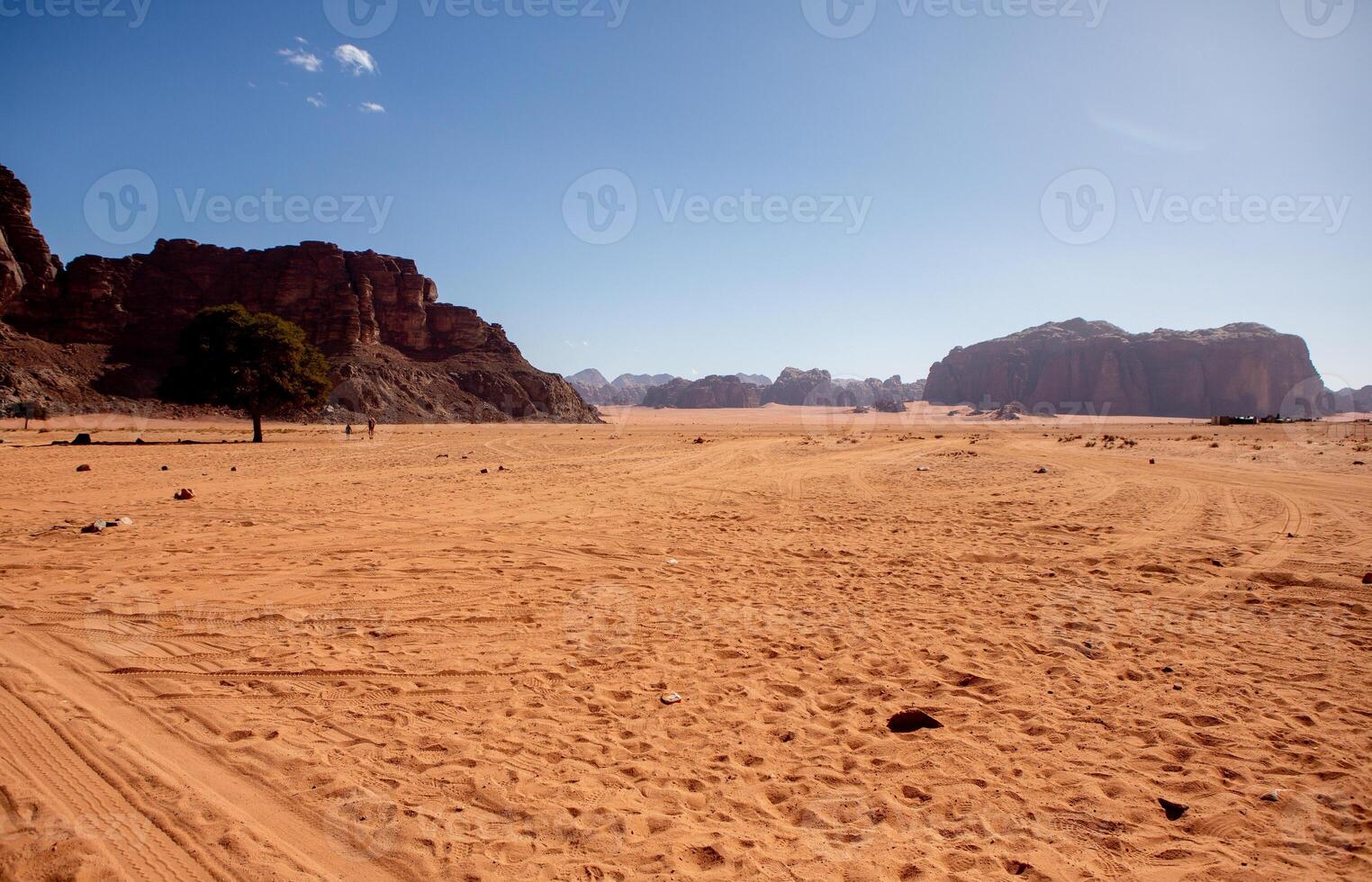 Wadi Rum Desert in Jordan. On the Sunset. Panorama of beautiful sand pattern on the dune. Desert landscape in Jordan. photo