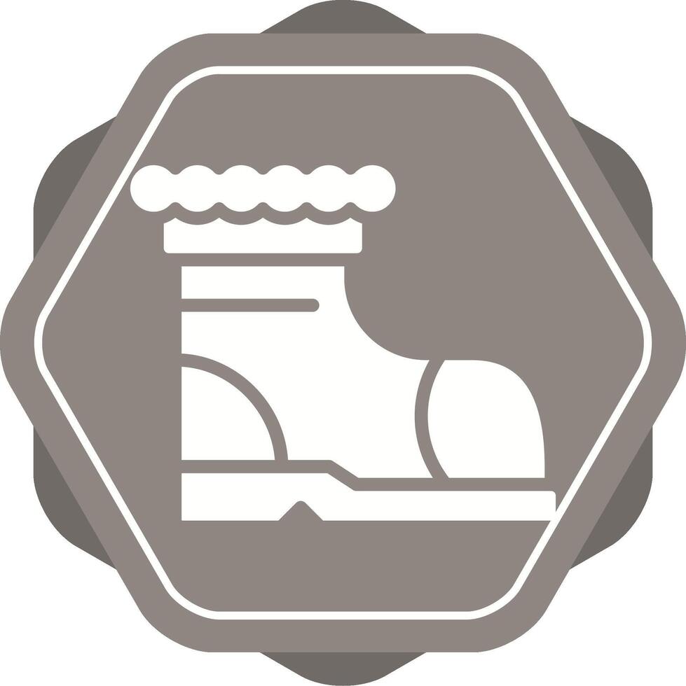 icono de vector de botas