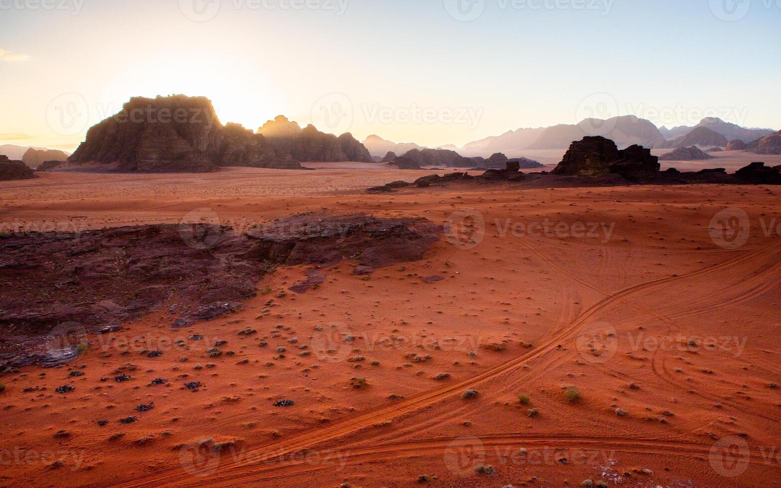 Wadi Rum Desert in Jordan. On the Sunset. Panorama of beautiful sand pattern on the dune. Desert landscape in Jordan. photo