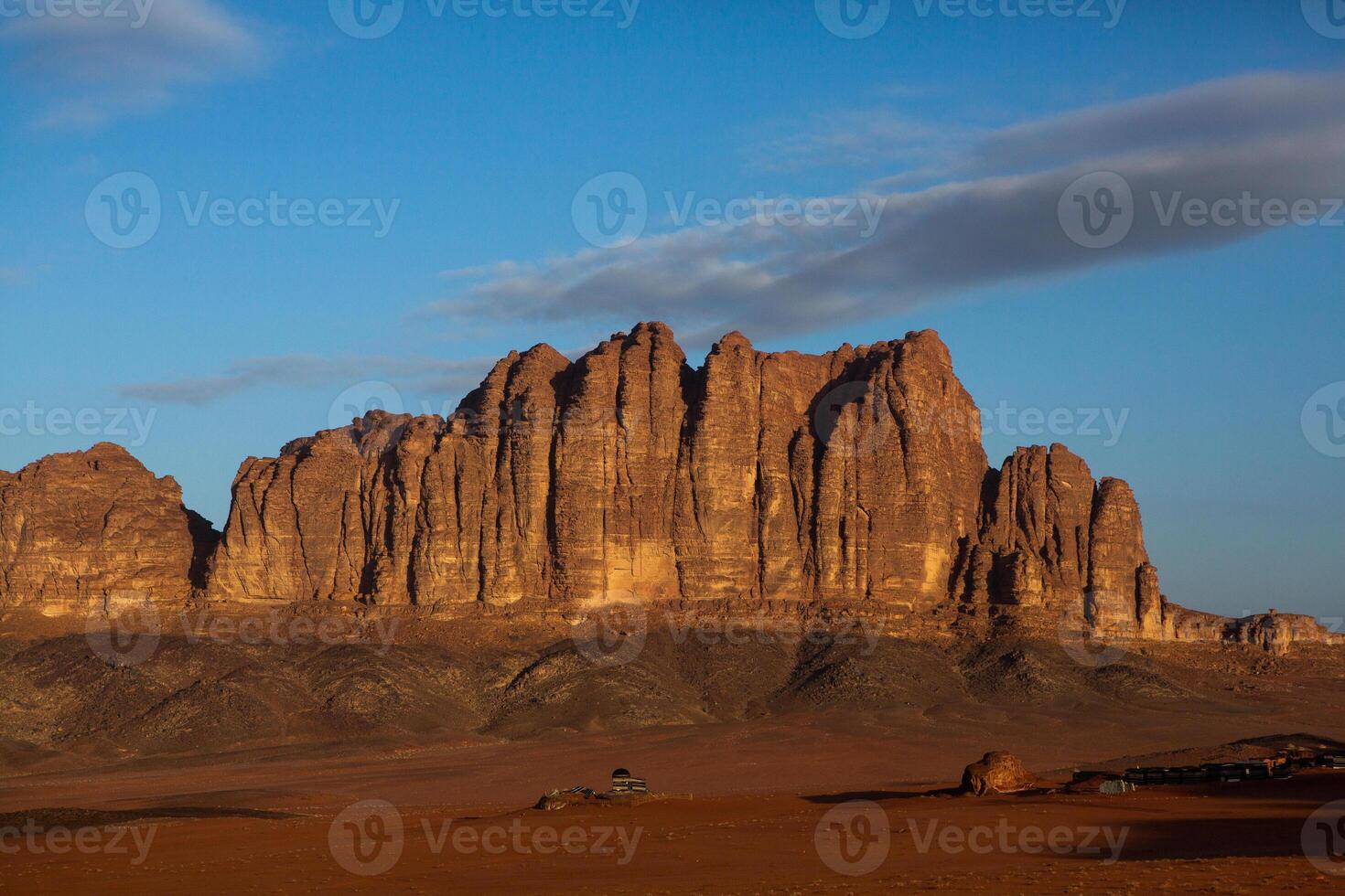 Wadi Rum Desert in Jordan. On the Sunset. Panorama of beautiful sand pattern on the dune. Desert landscape in Jordan. photo