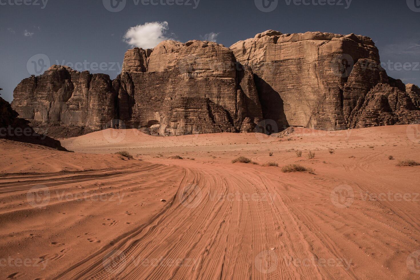 Wadi Rum Desert in Jordan. On the Sunset. Panorama of beautiful sand pattern on the dune. Desert landscape in Jordan. photo