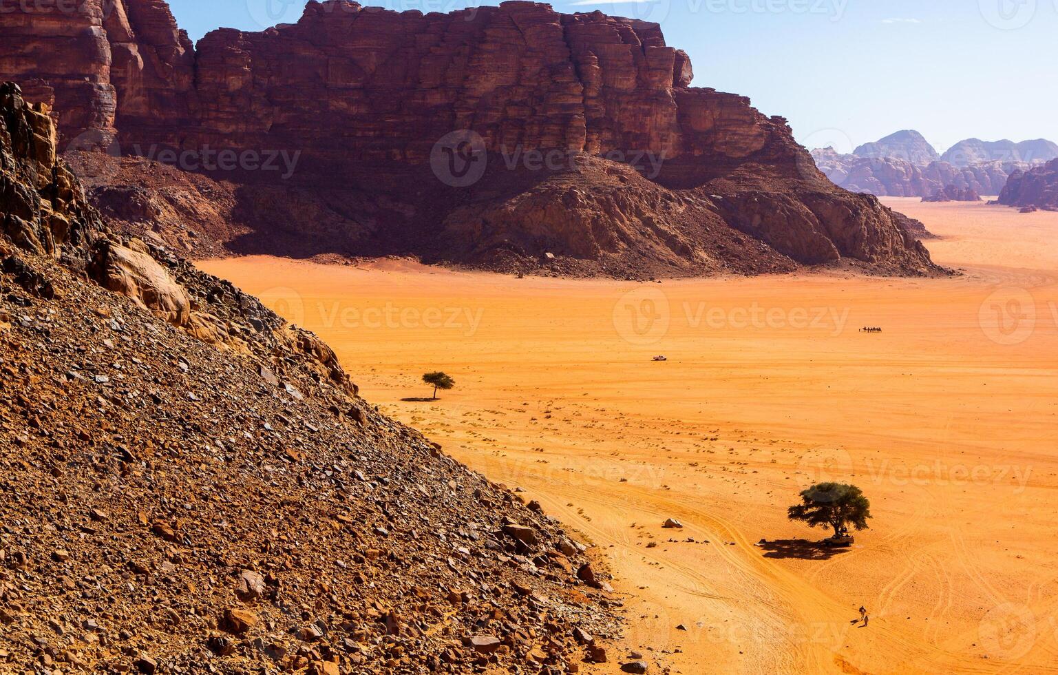 Wadi Rum Desert in Jordan. On the Sunset. Panorama of beautiful sand pattern on the dune. Desert landscape in Jordan. photo