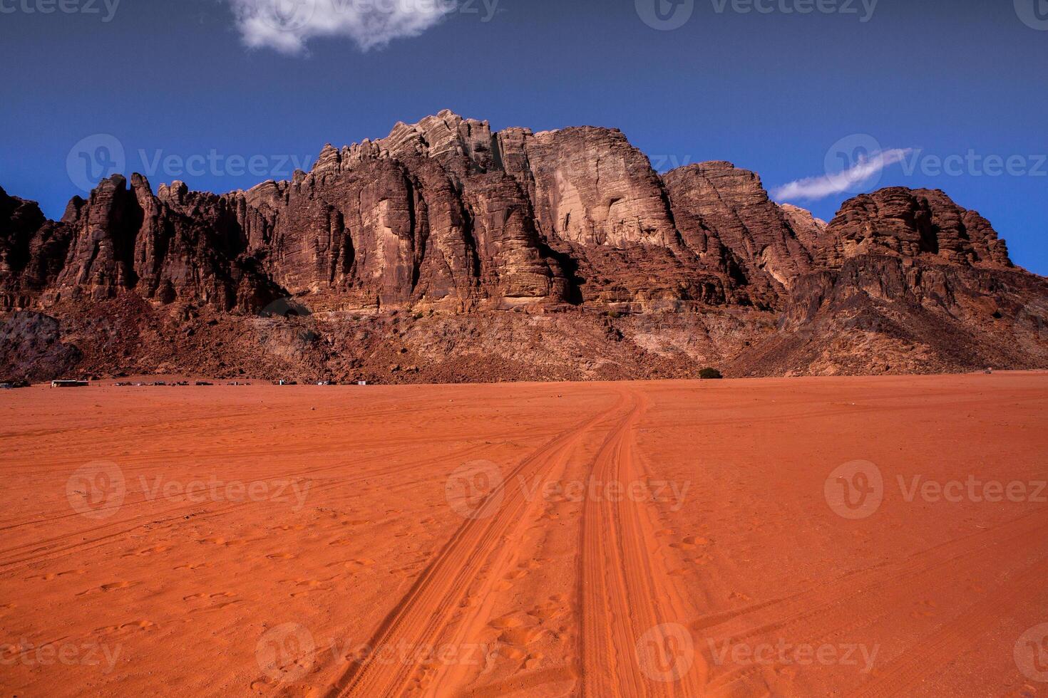 Wadi Rum Desert in Jordan. On the Sunset. Panorama of beautiful sand pattern on the dune. Desert landscape in Jordan. photo