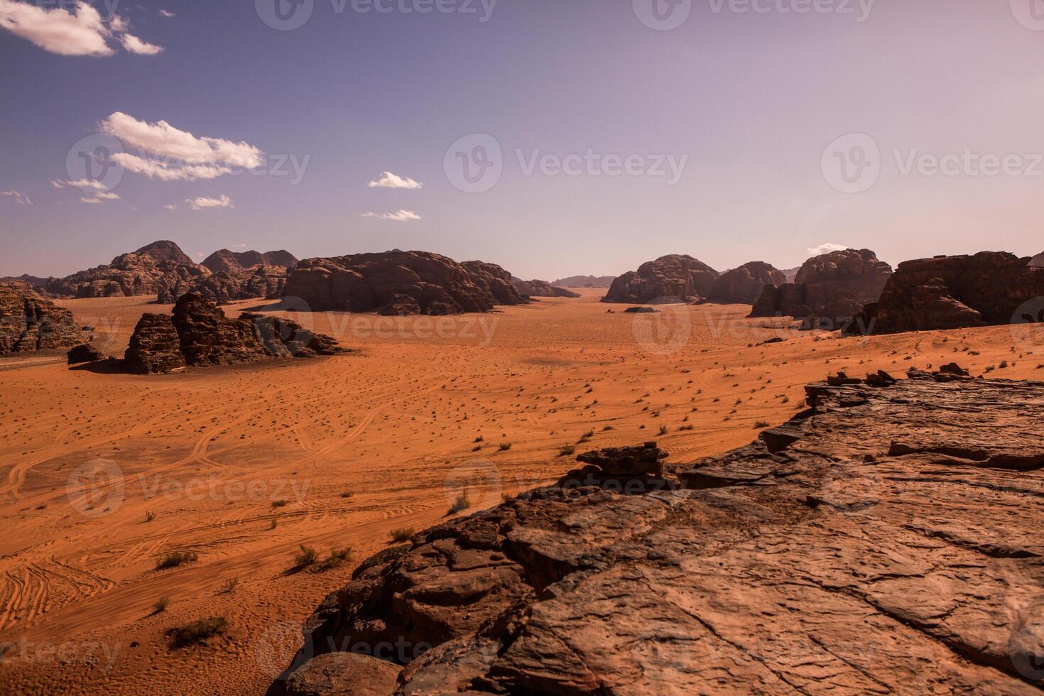 Wadi Rum Desert in Jordan. On the Sunset. Panorama of beautiful sand pattern on the dune. Desert landscape in Jordan. photo